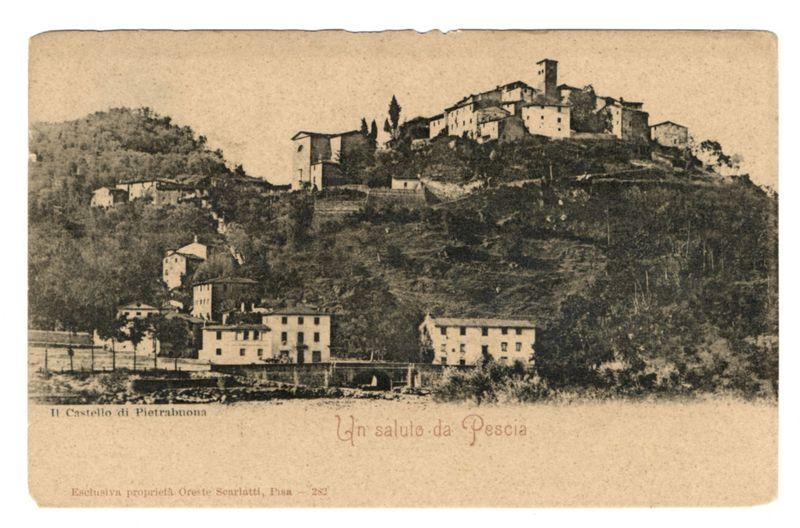 This black and white photograph features a historical scene of the Castello di Pietrabuona in Pescia, Italy. The image captures an elevated view overlooking several buildings situated atop what appears to be a hill or mountainous terrain with sparse vegetation. Several structures are scattered across this elevation, including houses with flat roofs and larger edifices that could potentially function as administrative or communal spaces.

The foreground of the photograph shows a more expansive area which seems less densely populated than the higher grounds above it. The overall tone of the image is somewhat faded, indicative of its age, and has an aged paper background characteristic of old postcards from the early 20th century.

There's text at the bottom left corner that reads "Il Castello di Pietrabuona," indicating the name of the castle being featured in this photograph. At the top center right part of the image is another piece of text, which says “Un saluto da Pescia,” likely translating to a greeting from Pescia.

The mention at the bottom left suggests that this postcard was exclusive property of Oreste Scarlatti, based in Pisa, and it's marked with a number "287". This information provides context about the ownership history or archival categorization.