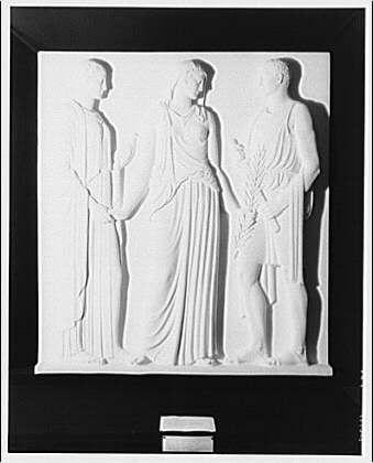 The image shows a black and white photograph of a sculptural relief depicting three figures, two men standing on either side with their hands raised in what appears to be an offering or greeting gesture. The central figure is seated and dressed in flowing robes, suggesting classical attire. This relief has been reproduced as models for the Tomb of the Unknown Soldier at Arlington National Cemetery around 1920-1950. It features a sculptor named Horydczak (Hurdydczak), active approximately from 1890 to 1971, and is likely part of an early attempt to create models for this historical site's commemorative monument.