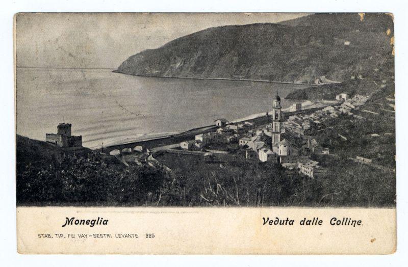 This image depicts a vintage postcard featuring the town of Moneglia in Italy. The photo captures an elevated view overlooking a coastal settlement with buildings nestled alongside a body of water, likely Lake Maggiore given its proximity to this lake's shores. A prominent lighthouse stands near the waterfront at the center-right portion of the image, and beyond it is another structure that appears as a bell tower or similar edifice atop what seems like part of a larger building.

The landscape includes rolling hills in the background with sparse vegetation visible on their slopes. The photograph has been labeled "Moneglia Veduta dalle Colline," indicating it's an aerial perspective from above, possibly taken from nearby elevated terrain known as 'collines' or hills. This label is written at the top right of the image.

At the bottom left corner, there are additional details in Italian: "STAB. TIP. F.W. VAY-SESTRI LEVANTE" and a reference number "223," likely indicating the name of the printing company or studio responsible for producing this postcard. The overall condition of the card shows signs of age with some discoloration, bends, and possibly water damage at certain areas.

The photograph was created by an unidentified photographer mentioned as FerroCandilera on a website source link provided in another description which seems to be related to more historical detail [...]