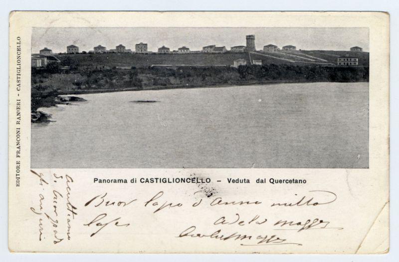 The image depicts an old black and white postcard featuring a panoramic view of Castiglioncello, Italy. The photograph captures the expansive landscape with buildings in the distance on elevated terrain overlooking water that could be a river or lake. Prominent structures include multiple multi-story buildings situated atop what appears to be a hill or small mountainous area.

In the foreground is handwritten text indicating that this postcard was sent by someone named "Bruno" from S. Lucia, Rome, and addressed it to his parents in Castiglioncello on November 30th. The handwriting suggests sentimental value as the sender seems to be expressing affection or perhaps a longing for home.

The top left corner of the card shows printed text which reads: 'Panorama di CASTIGLIONCELLO - Veduta dal QUERCETANO,' indicating that this was taken from Quercetano's viewpoint. The editor mentioned at the bottom is "FRANCINI RANERI," and it seems to have been published or distributed by an individual with a similar name, possibly in Rome.

The overall condition of the postcard suggests age; however, specific details such as creases, tears, or discoloration are not discernible from this angle. The image provides historical context for Castiglioncello's appearance and perhaps serves as a personal memento linking it to Bruno's family history.
