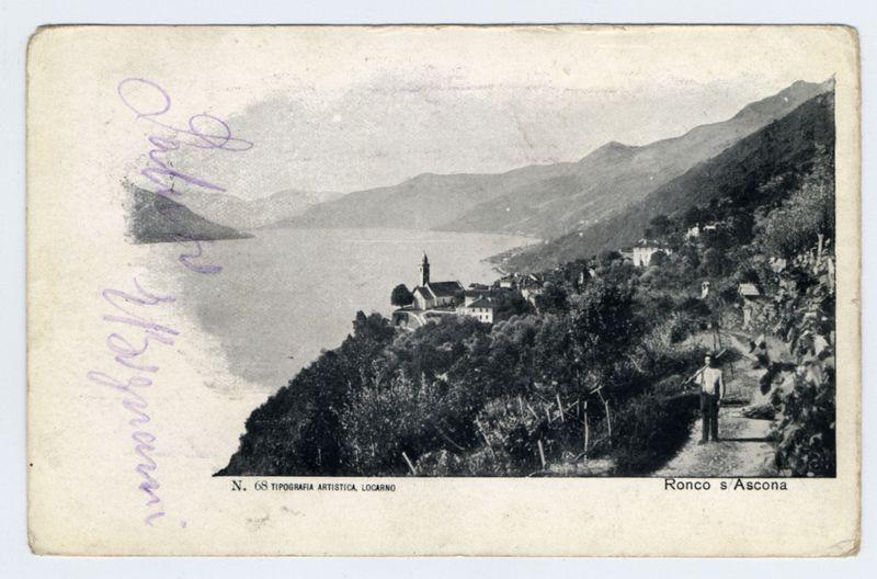 The image is a black and white photograph that appears to be an old postcard, showing a panoramic view of the town of Ronco s'Ascona on the shores of Lake Maggiore. The perspective captures rolling hills in the background with mountains further away under a clear sky. In the foreground, we see dense vegetation leading up to the town's buildings and structures.

Prominent features include:
- A church tower rising above other buildings near the water.
- Houses clustered around the base of the hillside where the church stands.
- Foliage and trees are abundant on both sides of a pathway that runs through what appears to be vineyards or orchards, leading towards the town. There is one person visible walking along this path.

The text at the bottom left corner reads "N. 68 TIPOGRAFIA ARTISTICA, LOCARNO," which suggests it's an artistic print by a specific company based in Locarno, and on the right side of the image: "Ronco s'Ascona." The card also has handwritten cursive text that appears to be part of its original use or ownership.

The condition of the postcard shows signs of age with some discoloration and minor stains.