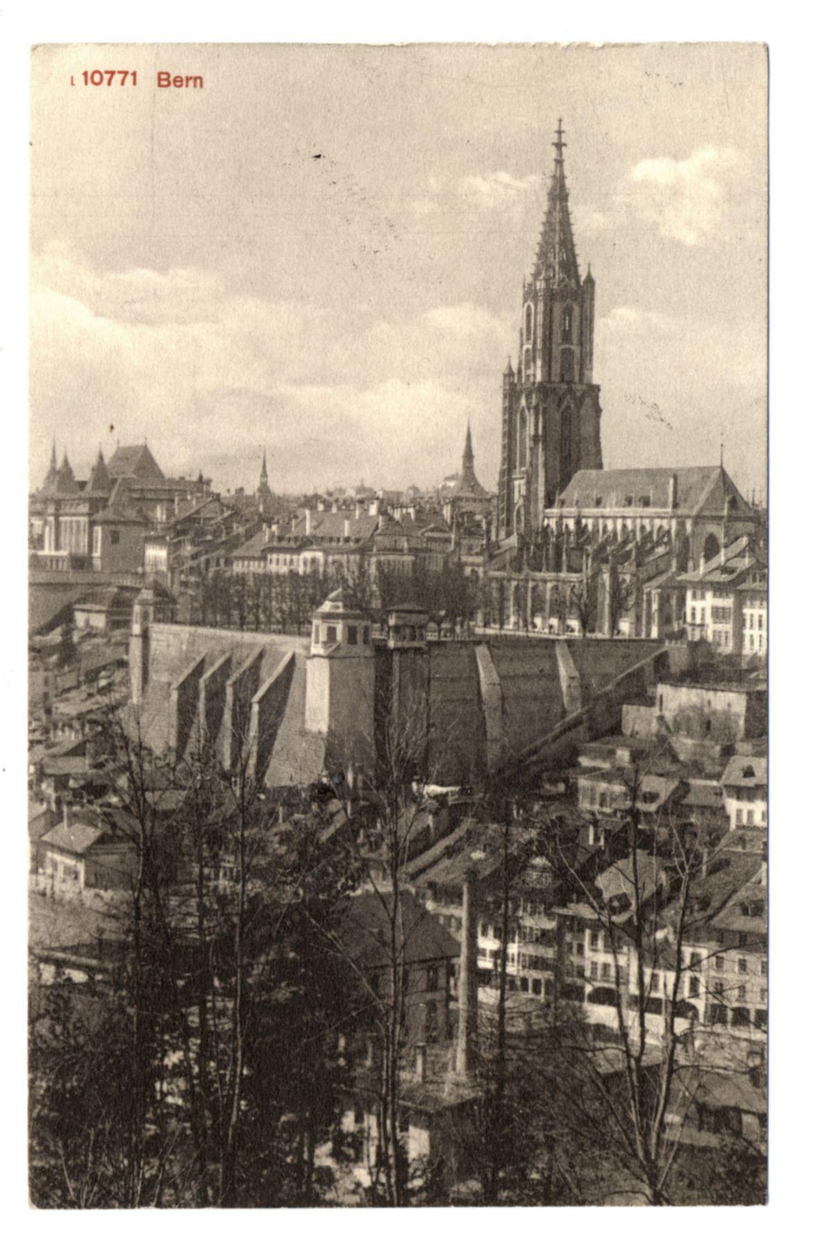 The photograph displays an aerial perspective of Bern, Switzerland. It features a prominent church with spires and numerous buildings in the background that depict traditional architecture indicative of European towns from several decades ago.

Additional information about this image can be found at BERN VEDUTA PANORAMICA https://images.loener.nl/FerroCandilera/full/6730/6730b6de89b10e7a26b824c4.jpg