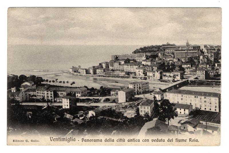 The image shows a black and white historical photograph of the old town of Ventimiglia, with views overlooking the river Roya. The scene depicts a coastal cityscape featuring numerous buildings in various architectural styles spread across hilly terrain leading down to what appears to be a waterfront area by the sea. A prominent church or cathedral is visible atop one hillside, indicating religious significance within the community.

The photograph carries text at the bottom which reads "Venetimiglia - Panorama della città antica con veduta del fiume Roya." It credits 'Editor G. Gallo.' This indicates that it was edited by someone named Gallo and provides a description of what is being shown, suggesting this image may be part of an old postcard or publication.

The historical context suggests the photo dates back to early 20th century based on its style and quality. The absence of modern elements like cars or contemporary structures helps maintain focus on the architectural heritag
