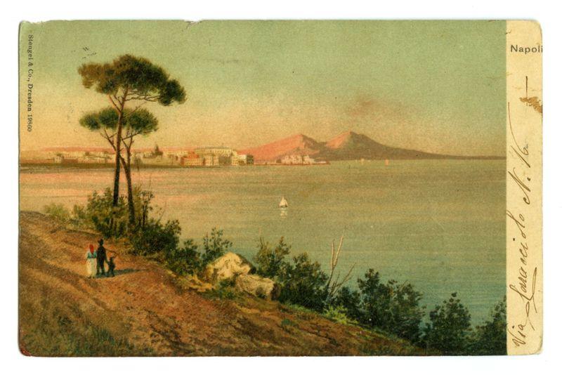 The image is a vintage painting depicting the coastal city of Naples, Italy. It features a serene view with clear skies and warm tones that suggest either dawn or dusk lighting conditions. The artist has captured a landscape with calm waters in the foreground leading to the Bay of Naples. A prominent feature on the horizon is Mount Vesuvius, partially shrouded by mist. In the near distance, there's an expanse showing European-style buildings clustered along what appears to be waterfront property.

To the left side of the painting, a solitary figure stands beside a tree with outstretched branches overlooking the scene, while another small group can be seen on a path leading up from the water towards this individual. The lush greenery suggests it's in late spring or summer season. A sailboat is visible in the distance on the calm sea.

There are handwritten inscriptions indicating the location as "Napoli" and possibly other annotations which may contain historical context or personal