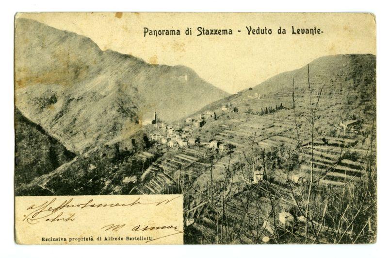This image features an old postcard depicting a panoramic view of Stazzema, with the text "Panorama di Stazzema - Veduto da Levante" prominently displayed at the top. The landscape shows hilly terrain and scattered structures that suggest a village or settlement nestled within it. Bare trees are visible in the foreground on both sides of the image, indicating either winter season or arid conditions.

A handwritten inscription is present towards the bottom left corner with names "Alfredo Bertellotti" and another signature which appears to be his as well. Below this text, there's a note stating that it belongs exclusively to Alfredo Bertellotti. The overall condition of the postcard shows signs of aging such as discoloration and creases.

The image has a sepia tone common in old photographs or prints from an earlier era, which contributes to its historical feel.