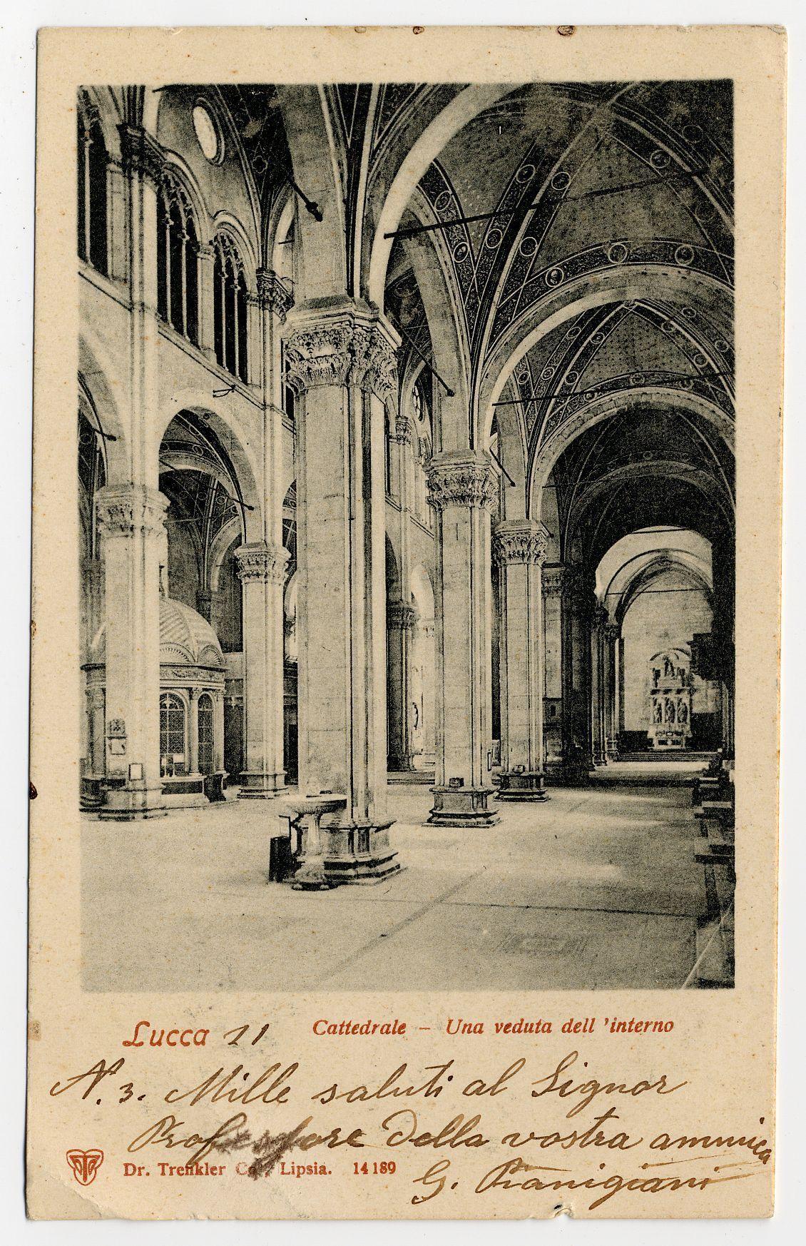 The image displays an old, monochromatic postcard showcasing the interior of a grand cathedral. The photograph captures tall arches and columns characteristic of Gothic architecture, suggesting it is from a historical building possibly dating back to the medieval period.

Various text elements are printed on the card: "Luca 21 Cattedrale - Una veduta dall'interno" at the top indicates that this depicts the interior view within Lucca Cathedral. Below in Italian, there's an inscription crediting Dr. Trentkler from Lipsia with the photograph dated January 14th, 1918.

In red ink, on what appears to be a handwritten note added later by another individual possibly named Signor Prof. d'alla vostra ammio G. Planigari, acknowledging or perhaps gifting the postcard as per their profession and relationship with Dr. Trentkler.

The condition of the card suggests it has been handled frequently over time, evidenced by creases and slight discoloration. The image's source is cited in a URL at t