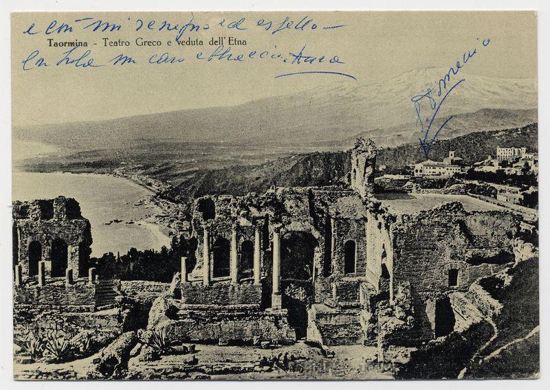 The image displays a black and white photograph of the ancient Greek theater in Taormina, with visible inscriptions. The ruins show remnants of columns and arches typical of classical architecture, indicative of historical significance.

At the top left corner is handwritten cursive text that reads: "L' amm. reneipont ed eselto - Taormina-Teatro Greco e veduta dell'Etna ca hlo m an ehpccintno." This suggests a personal note, possibly commemorating a visit to the site.

On the right side of the photograph is another handwritten signature that appears in cursive and is less clear but seems like "D. Menzio," potentially indicating the author or photographer's name.

In blue ink across the top left corner are additional notes: "- Taormina - Teatro Greco e veduta dell'Etna" which translates to "(Taormina) Greek Theater and view of Etna." The text in cursive, "Ca hlo m an ehpccintno," likely refers to a personal remark or memory.

In the top right corner, there's another signature-li